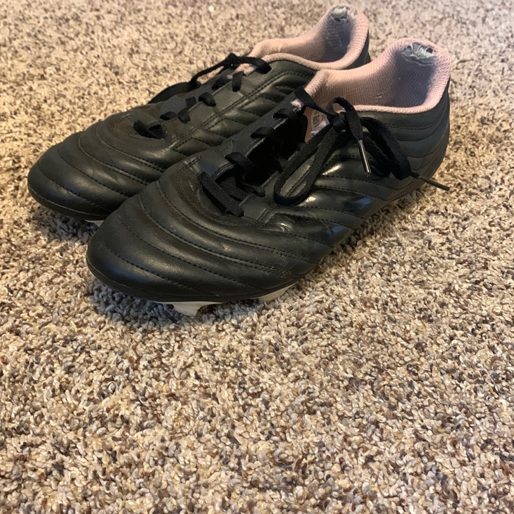 Worn adidas soccer cleats for women